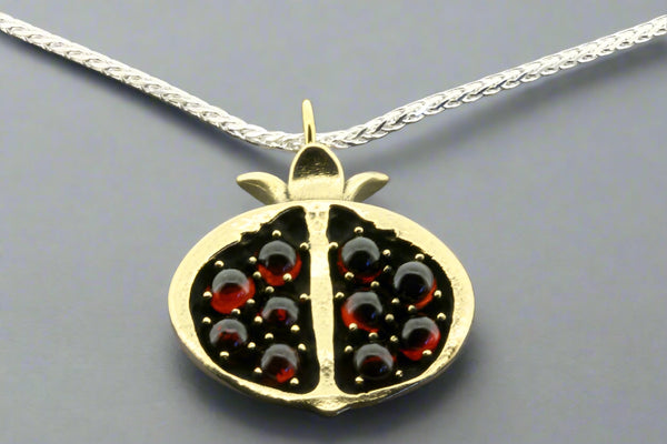 Pomegranate pendant on 55 cm silver chain - brass & garnet