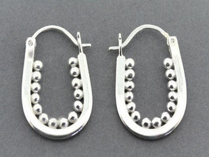 silver hoop earring